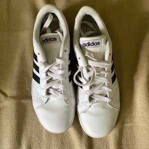 White Adidas Superstars